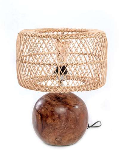 A table lamp with a spherical wooden base and a rattan lampshade.