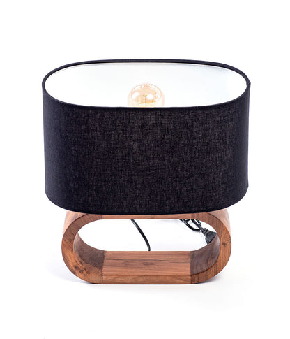 A table lamp with a natural linen textile shade and a wooden base on a white background.