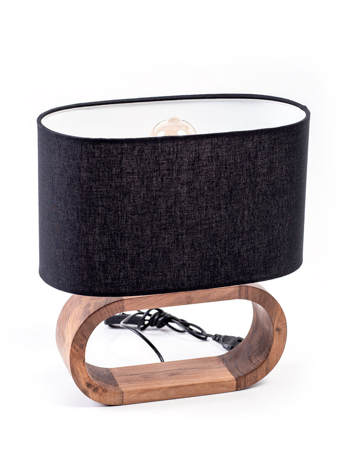 A table lamp with a natural linen textile shade and a wooden base on a white background.